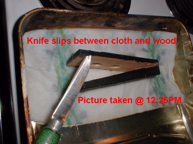 Knife slips easily between cloth and wood