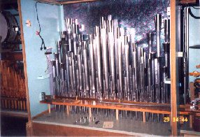 Center cabinet, showing, in addition, the Aeolian reeds (large conical tuners).